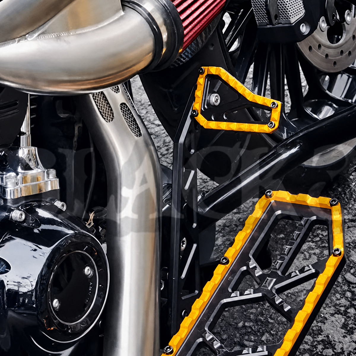 Gold brake pedal and foot peg installed