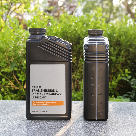 One-litre motorcycle transmission lubricant bottle front and side view