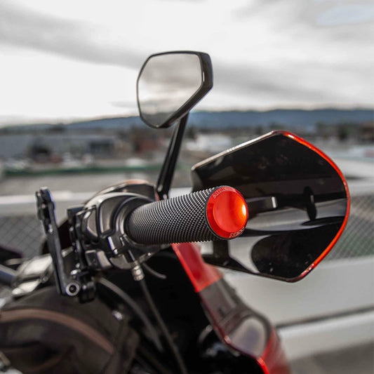 Red end-cap grip installed on motorcycle