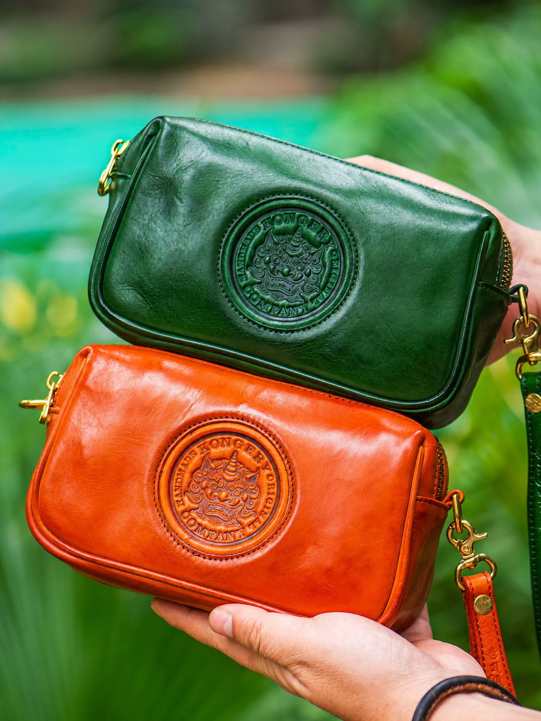 red-brown and emerald green Tianlu leather biker wallets