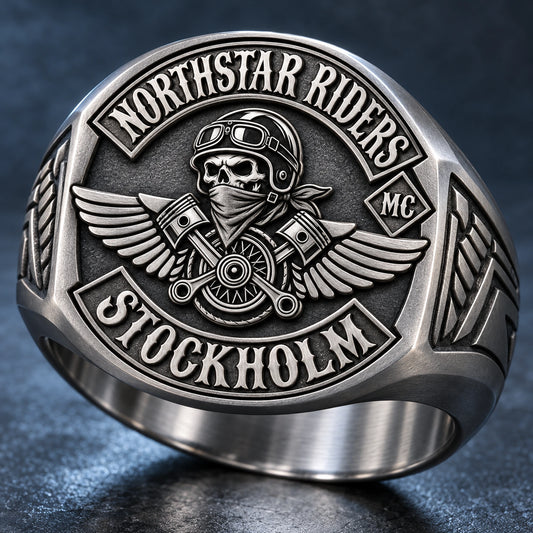 Custom Northstar Riders motorcycle club ring in lightweight satin titanium with cool-gray machined relief.
