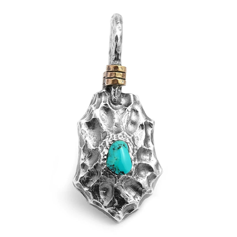 Turquoise dragon-scale shield sterling silver biker pendant on white background