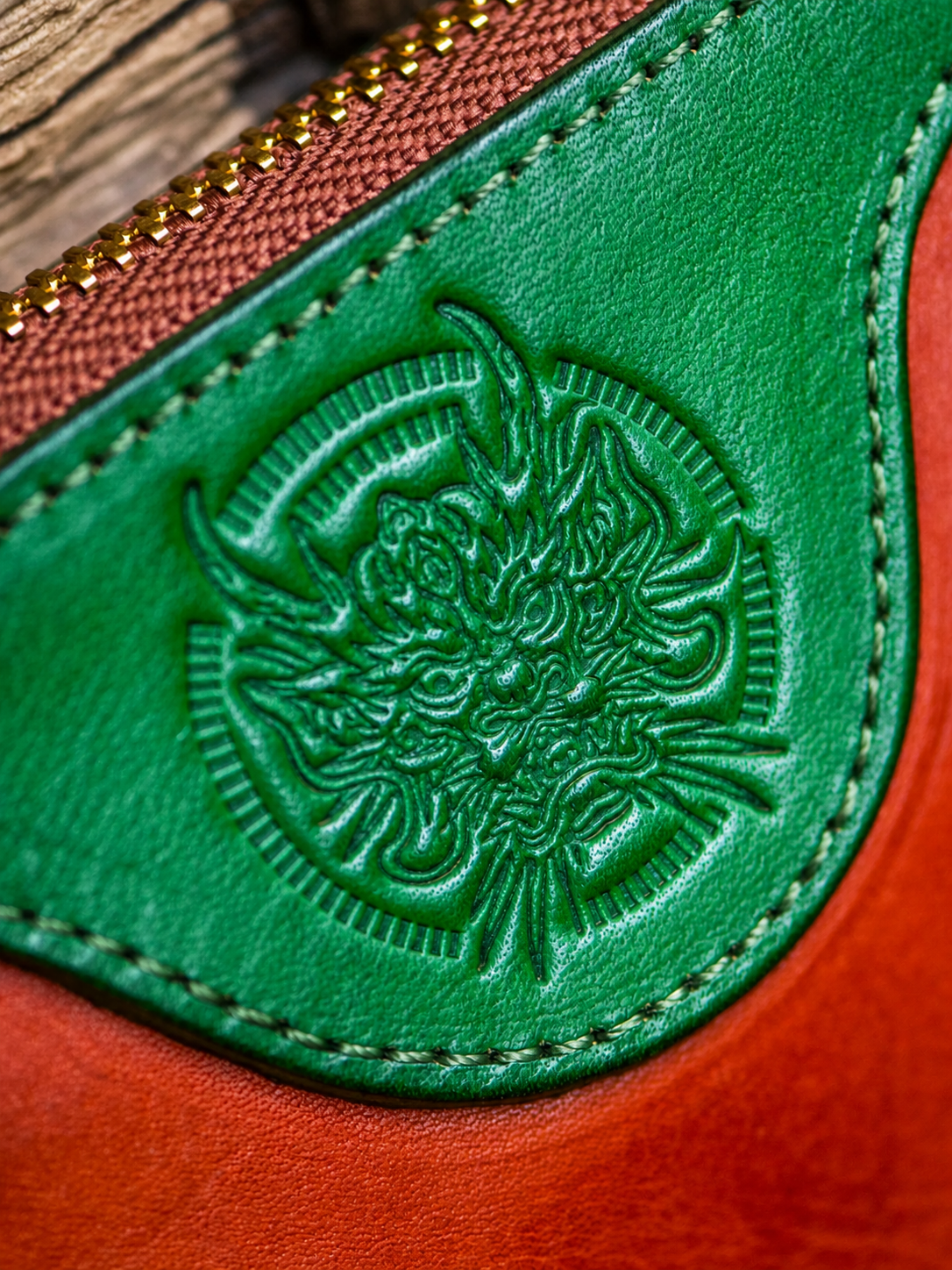 embossed dragon detail on two-tone cowhide biker clutch wallet