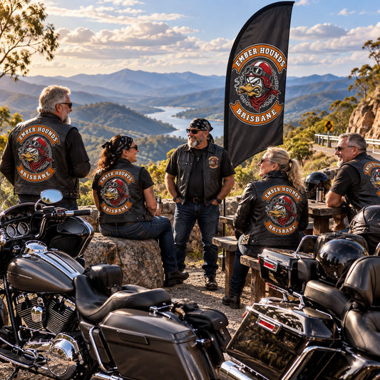 Designed For Motorcycle Culture: custom motorcycle club feather flag shown in mature mixed-gender road crew at a mountain turnout with unbranded American V-twin touring motorcycles.