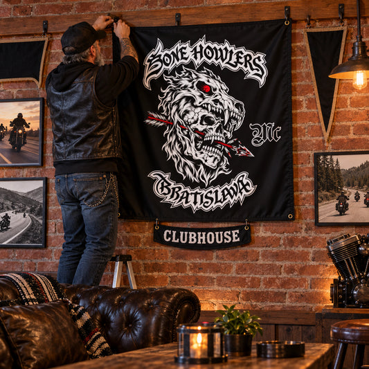 Club steward hanging a personalized motorcycle club exchange flag in a brick clubhouse.