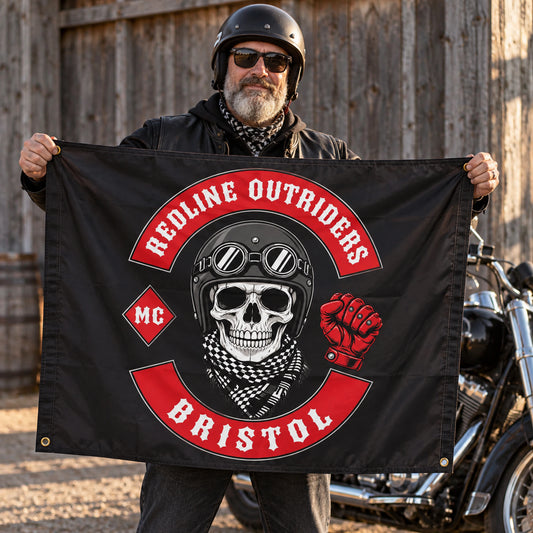 Rider displaying a classic rectangular motorcycle club exchange flag at an outdoor meet.