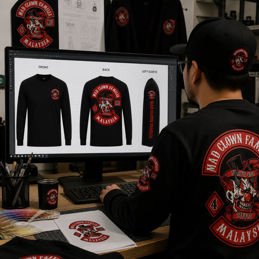 Designer reviewing front, back and sleeve mockups for a custom motorcycle club long-sleeve shirt.