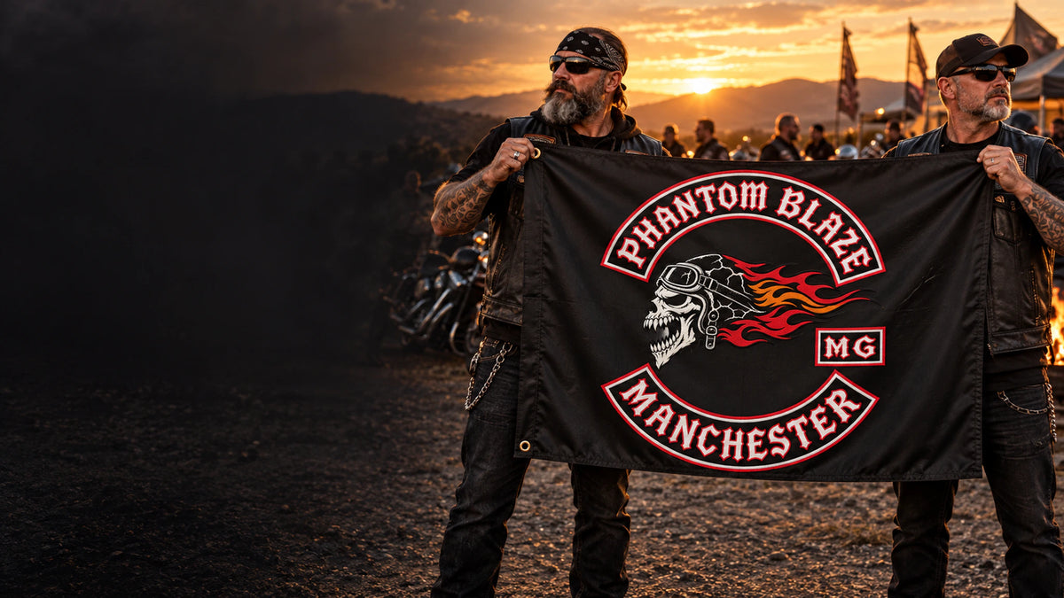 Motorcycle club members displaying a custom exchange flag with an authorized club emblem beside heavyweight V-twin motorcycles.