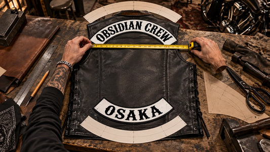 Complete leather motorcycle vest being measured for custom rocker width, curvature and spacing.