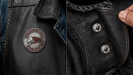 Custom 2D biker vest pin shown at a realistic scale on heavy denim.
