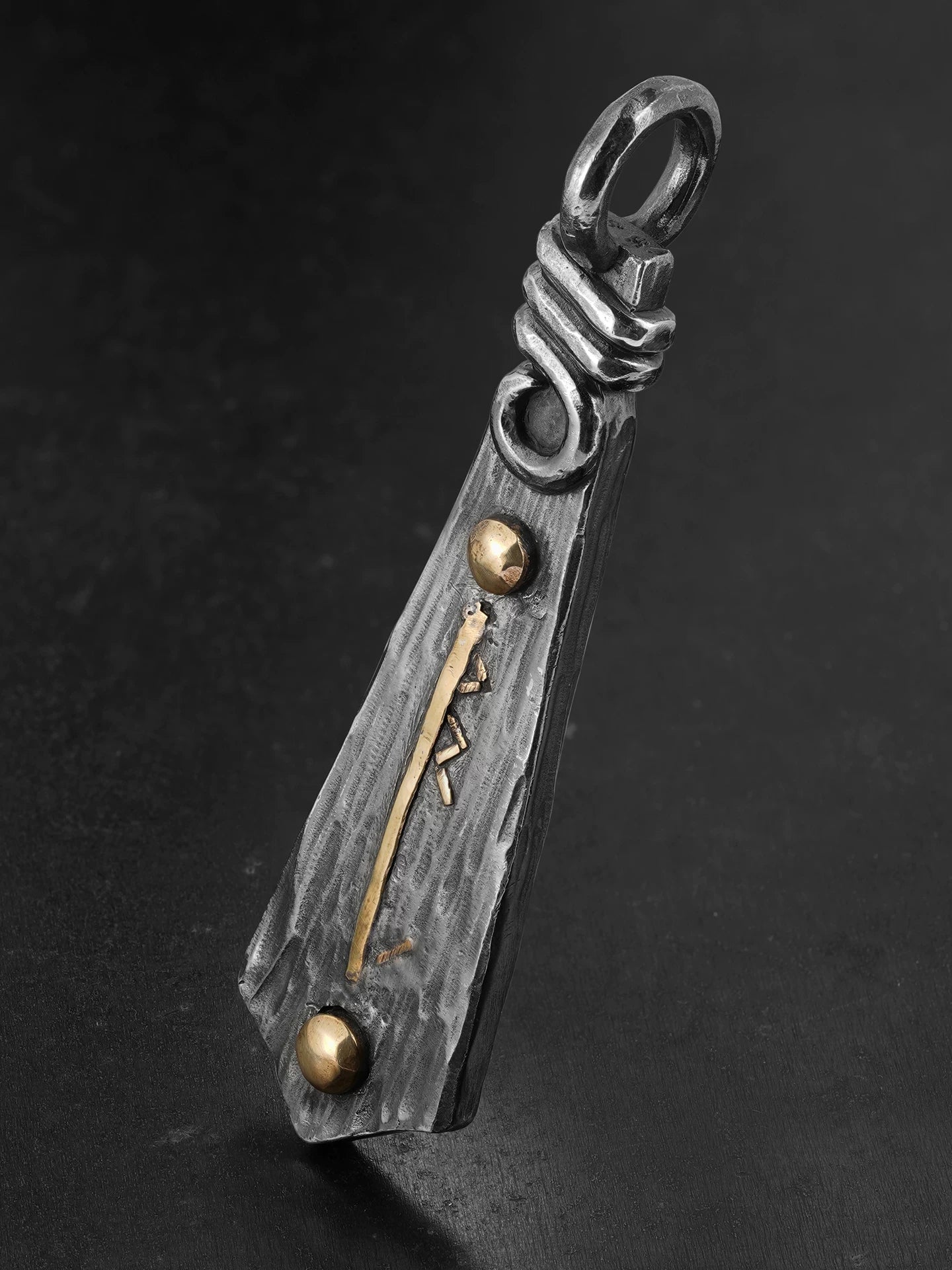 Viking rune sterling silver pendant angled view