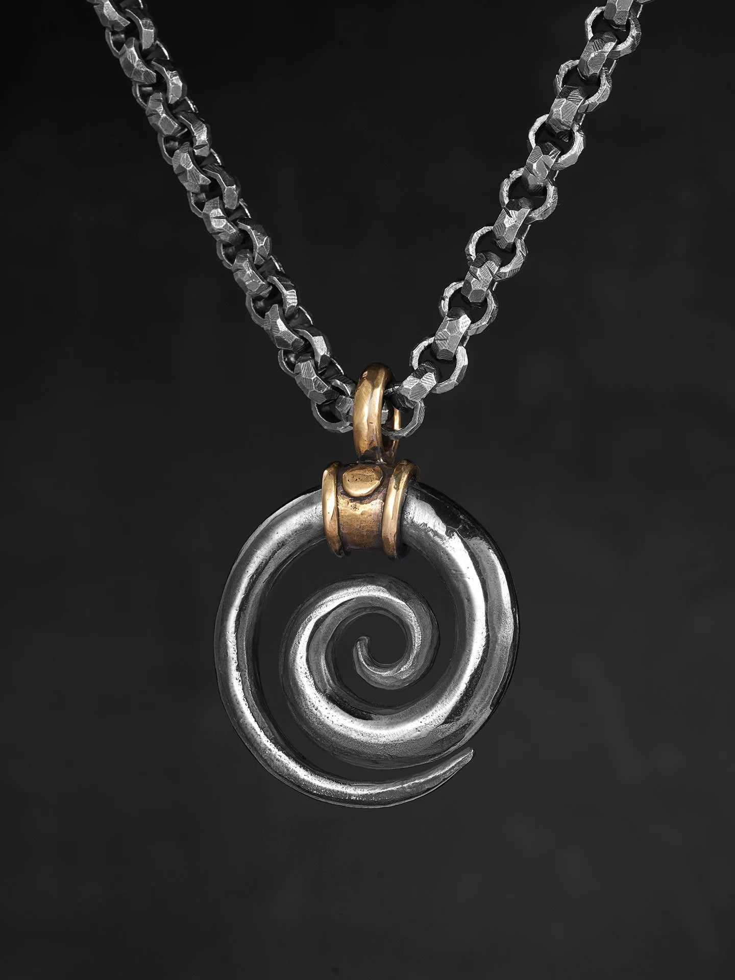 Viking spiral totem silver pendant shown with chain