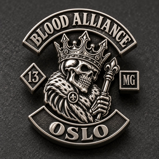 Antique silver BLOOD ALLIANCE club pin under raking light with bright raised details and deep dark recessed shadows.