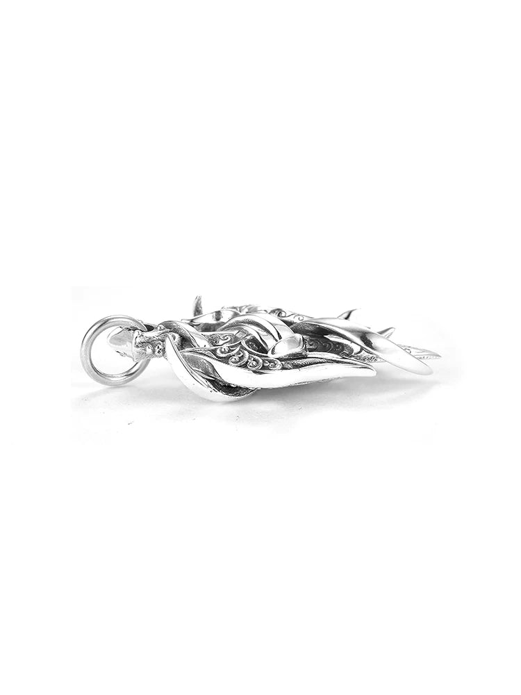 Side profile showing engraved wrapped trident biker pendant